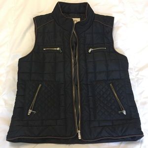 Day trip puffer vest with gold zippers